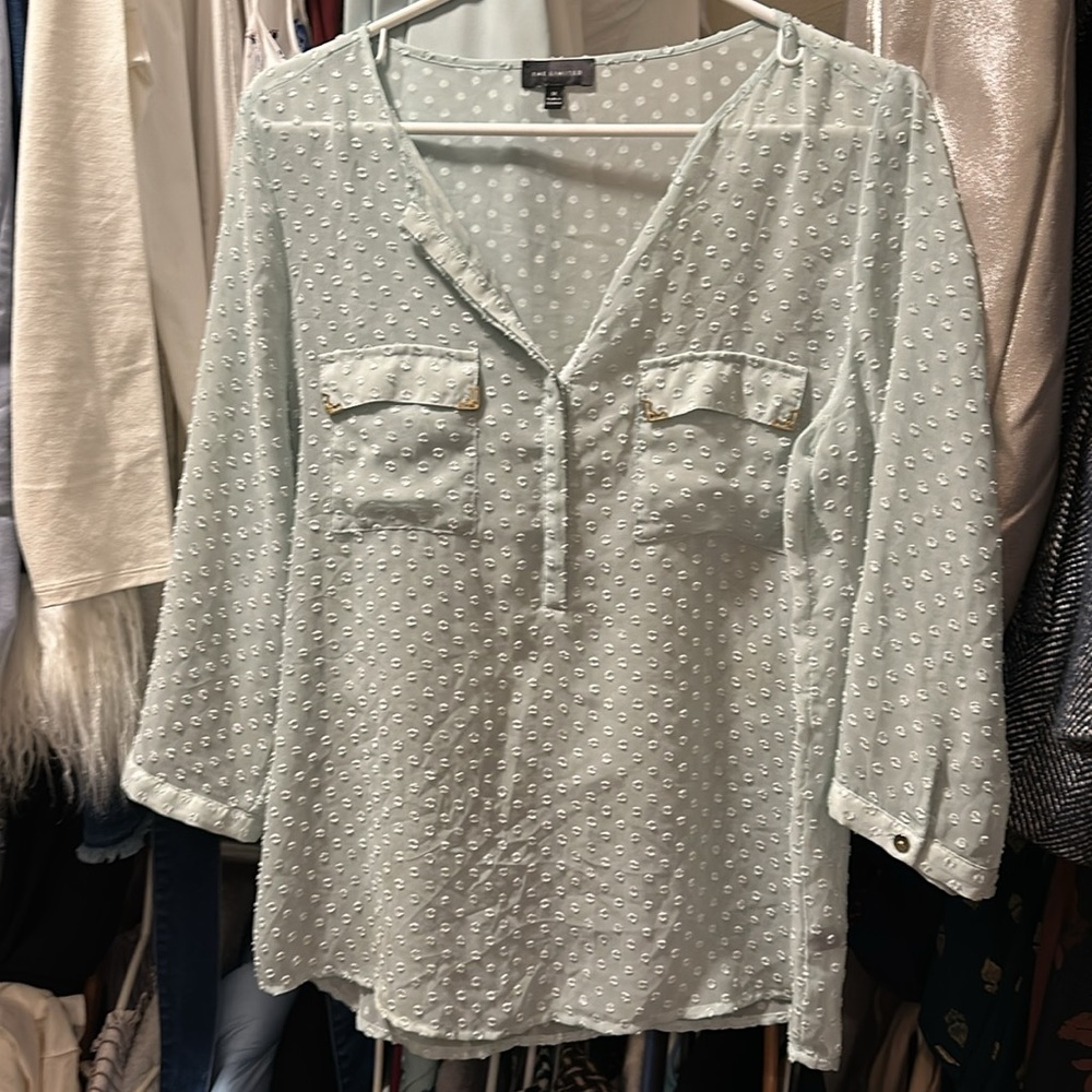 Beautiful sage green blouse. One of my favorites. Great to wear over a tank.